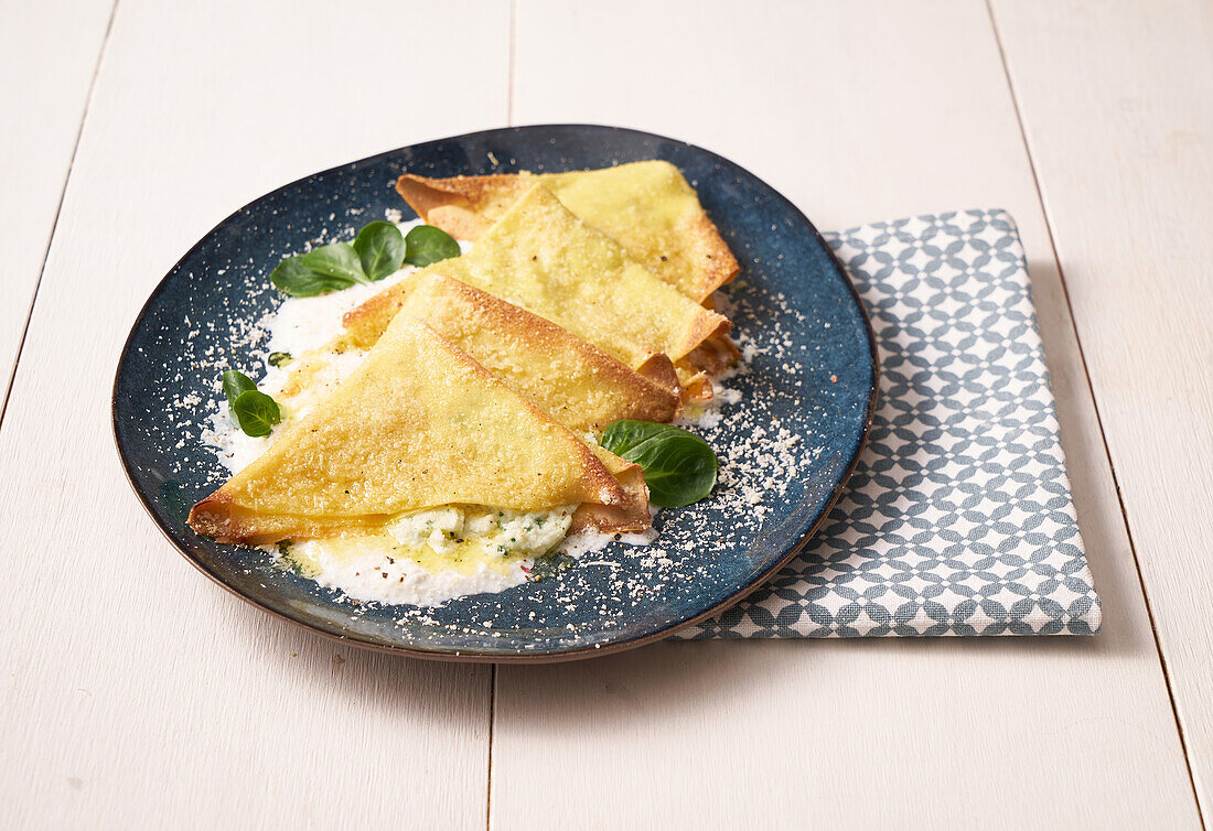 Crêpes filled with ricotta and spinach