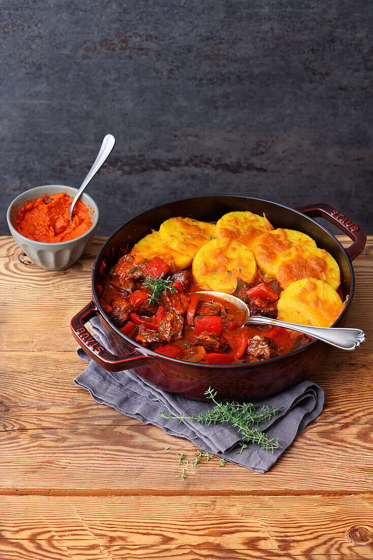 Paprika goulash with polenta topping