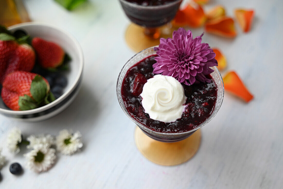 Red fruit jelly with whipped cream