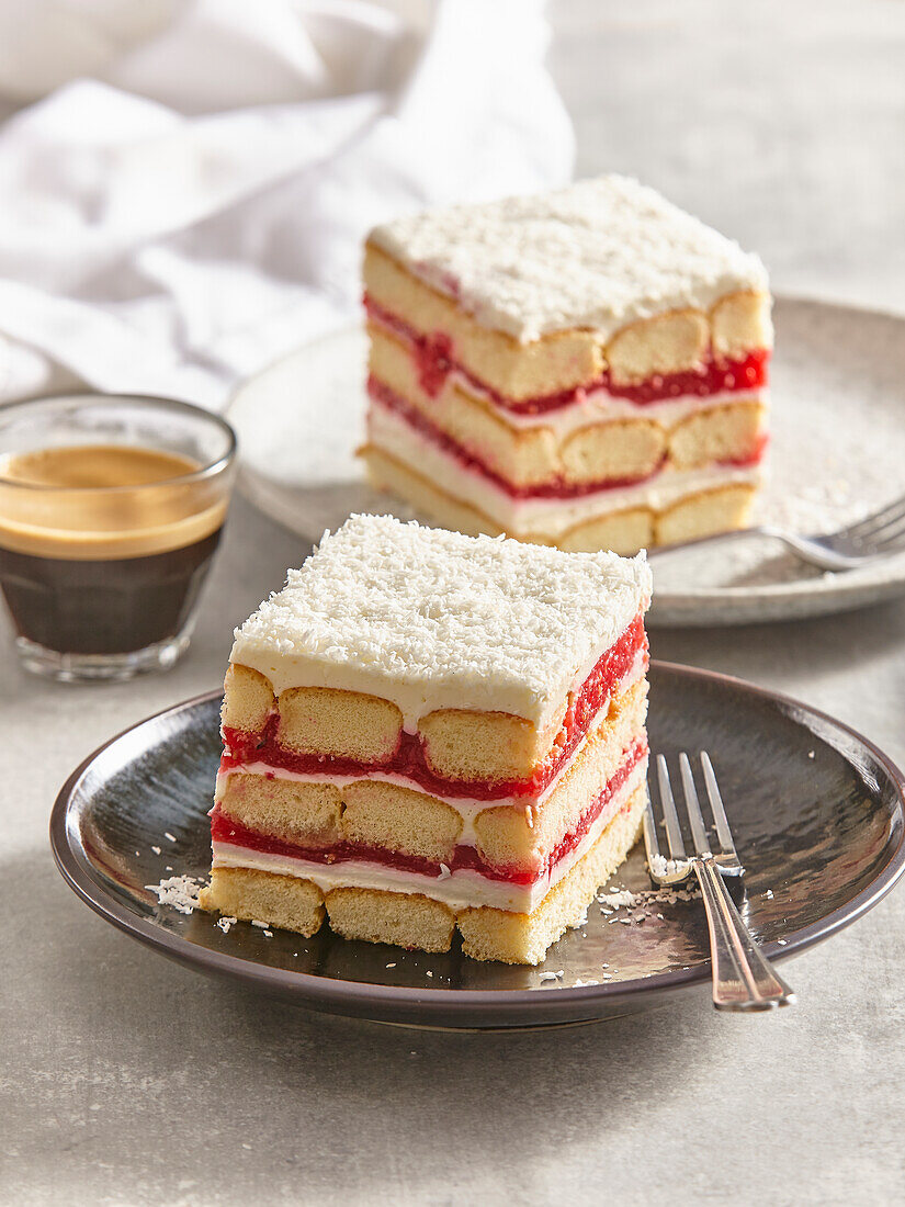 Raspberry tiramisu with white chocolate and coconut flakes