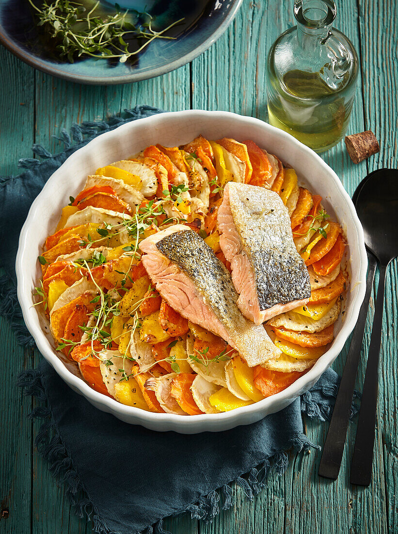 Root vegetable gratin with parmesan and salmon