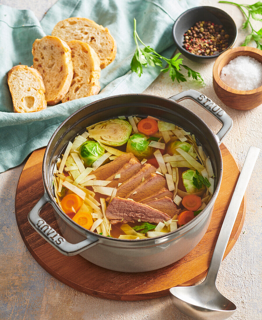Beef soup with Brussels sprouts, carrots and leek