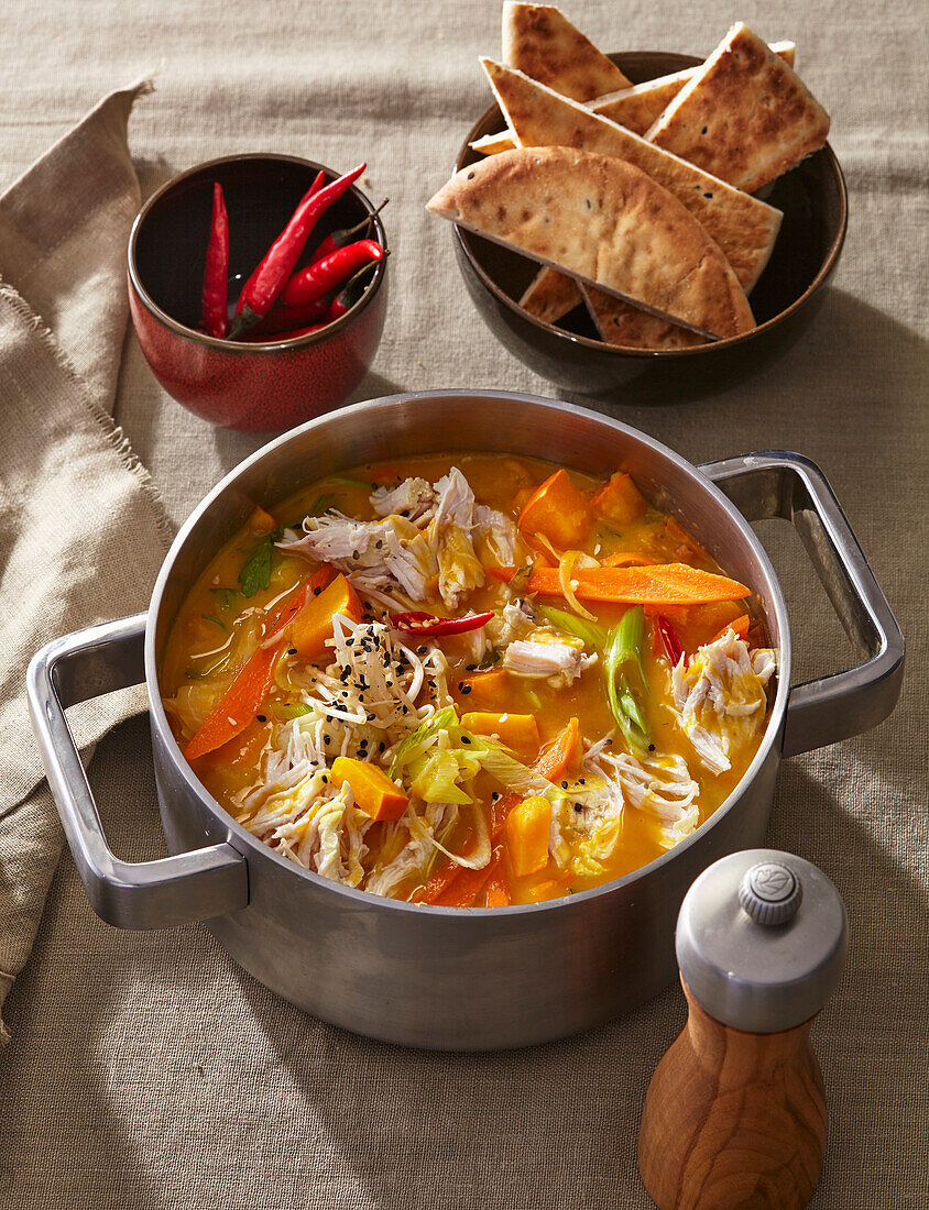 Chicken curry with pumpkin and carrots in the slow cooker