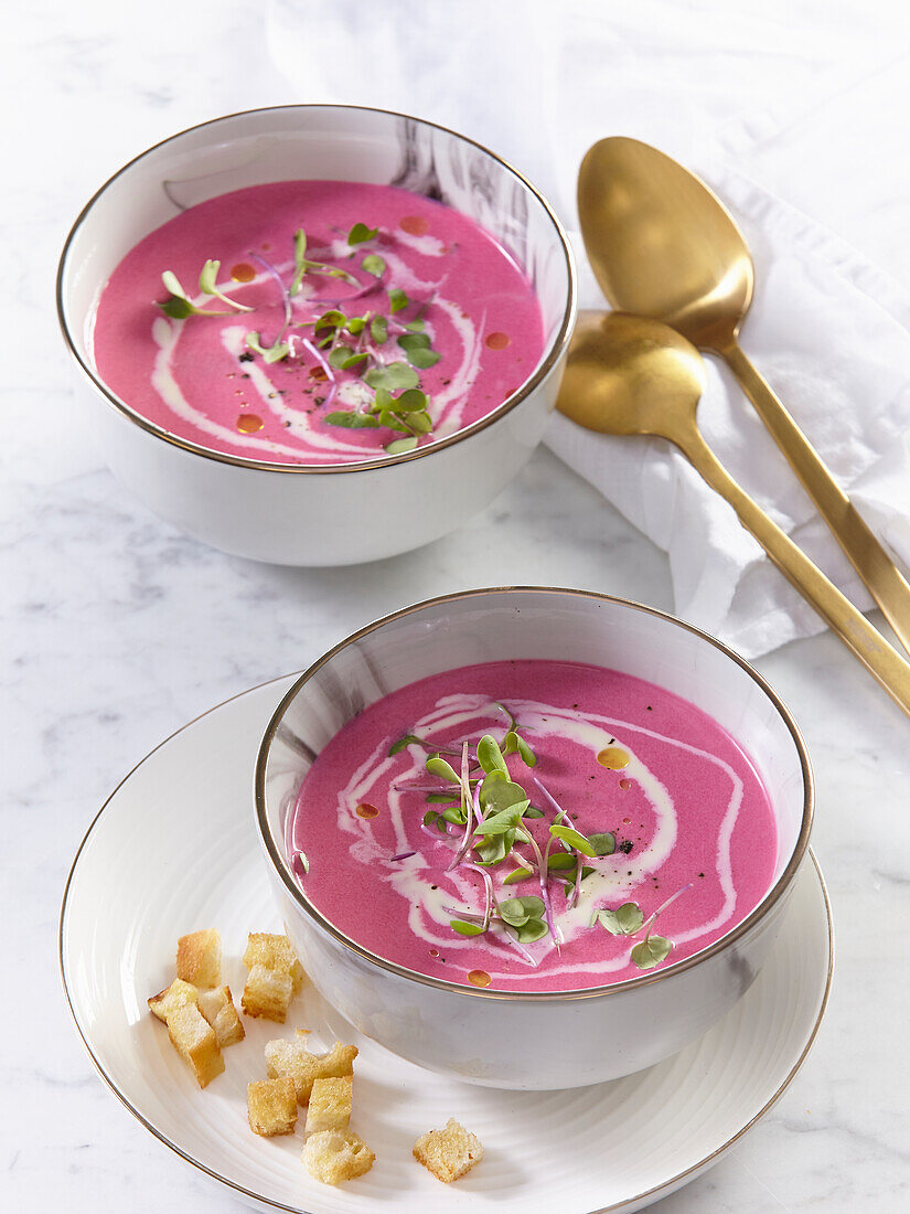 Beetroot and leek soup with cream and croutons