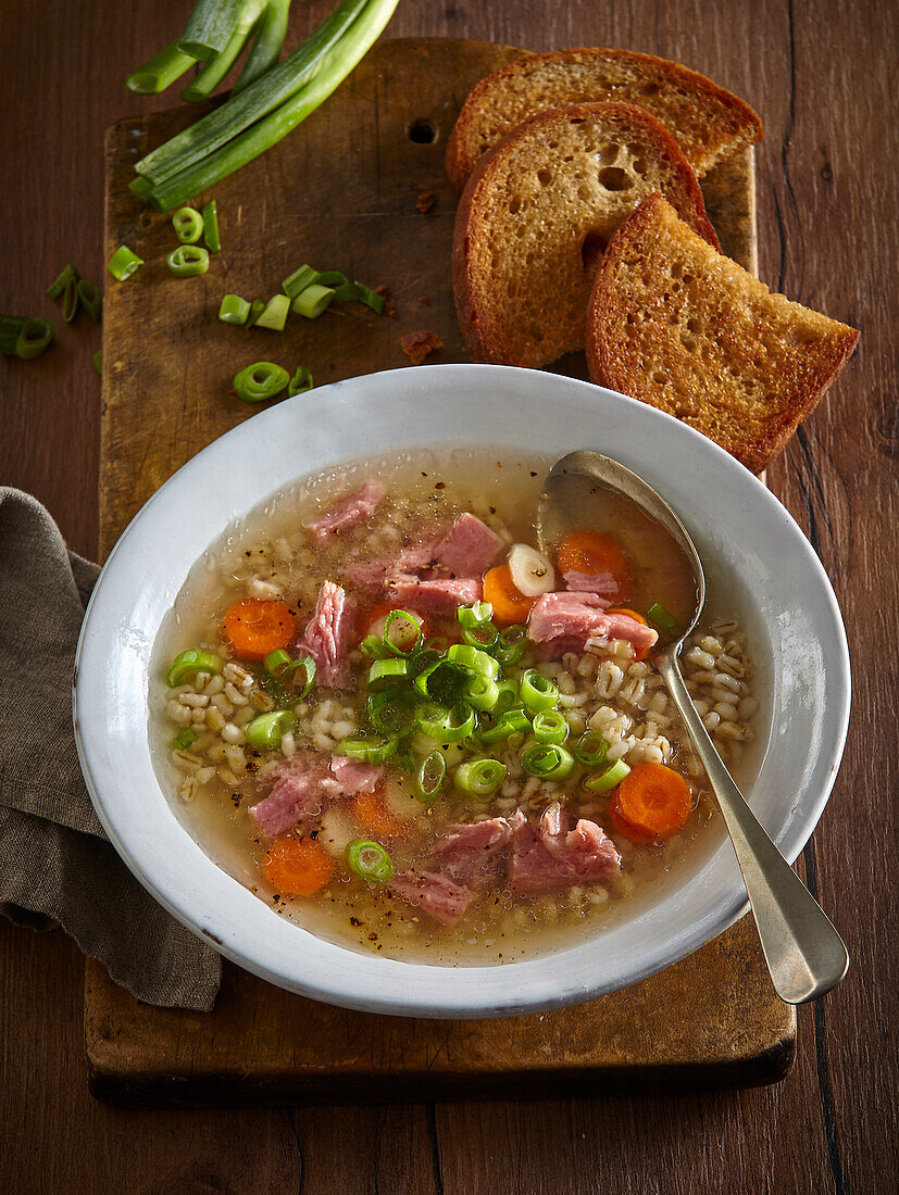 Barley soup with smoked pork and vegetables