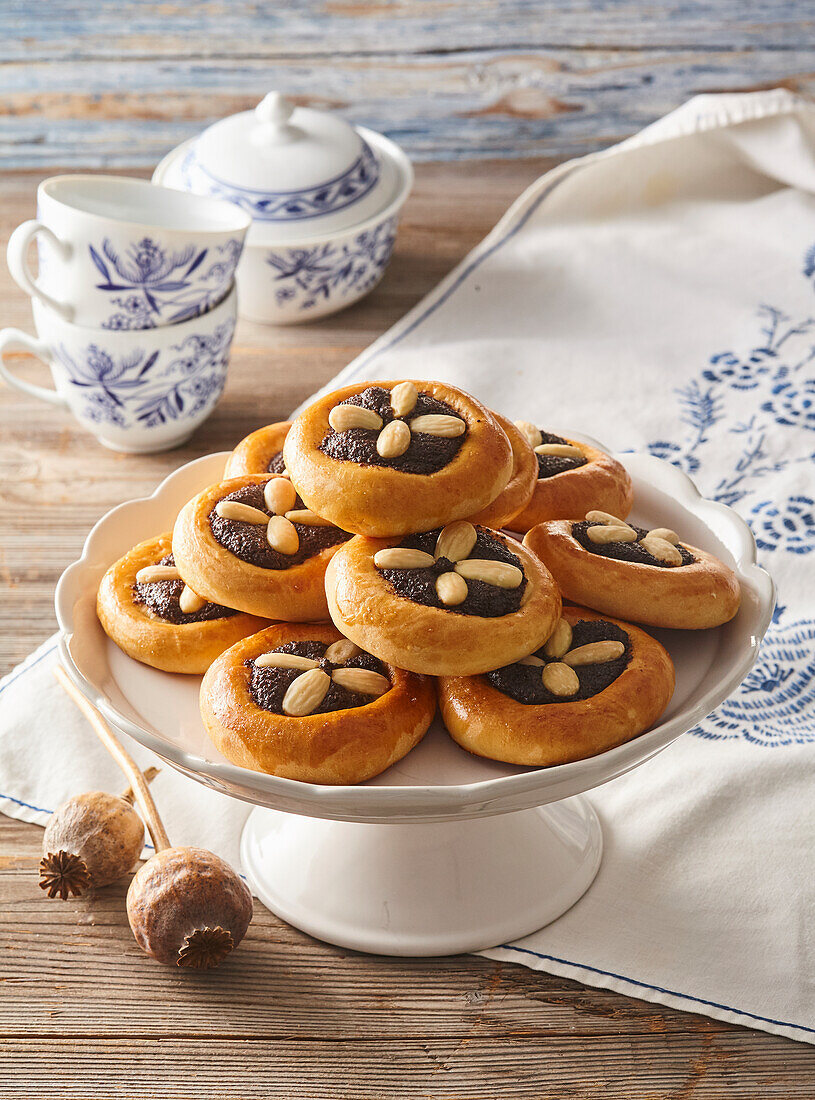 Yeast pastry with poppy seed filling and almonds