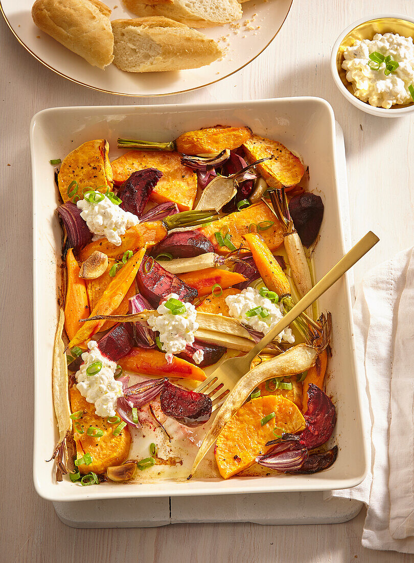 Oven-roasted root vegetables with cottage cheese and herbs