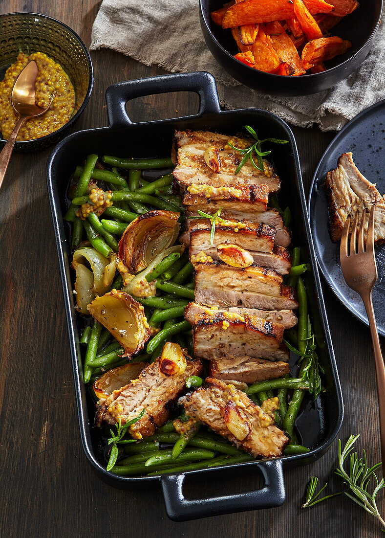 Roast pork belly with maple-mustard sauce and green beans