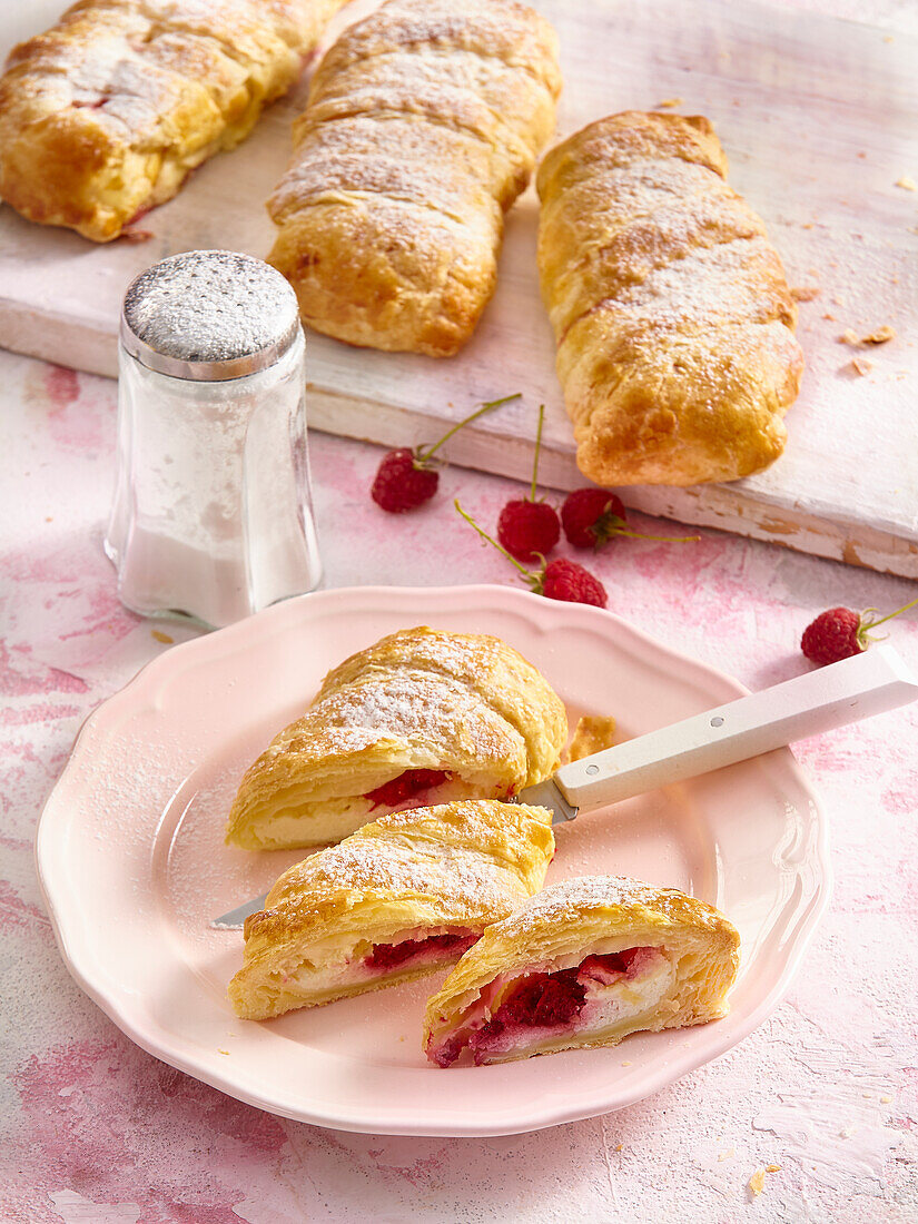 Puff pastry pockets with raspberry and cream cheese filling