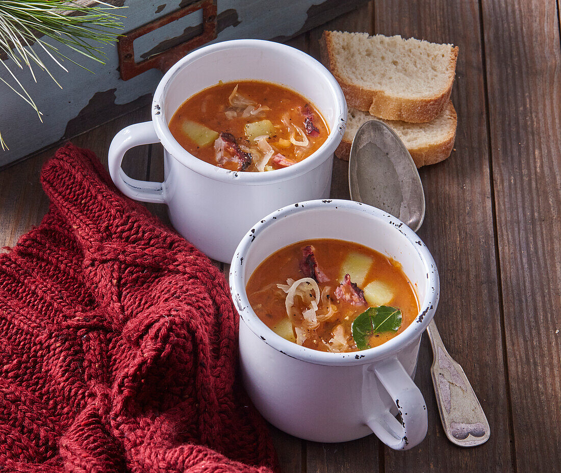 Vegetable soup with sausage, sauerkraut and potatoes