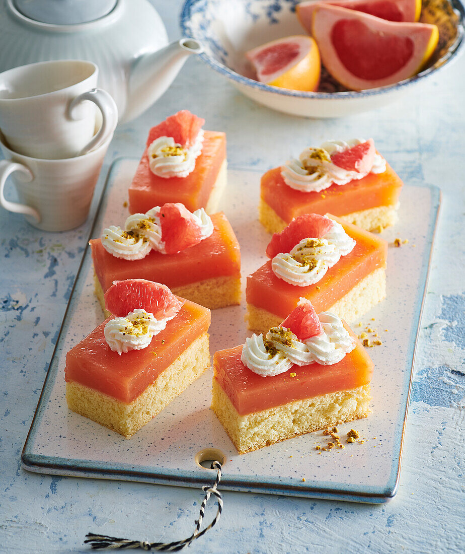 Sponge cake with grapefruit cream and whipped cream topping