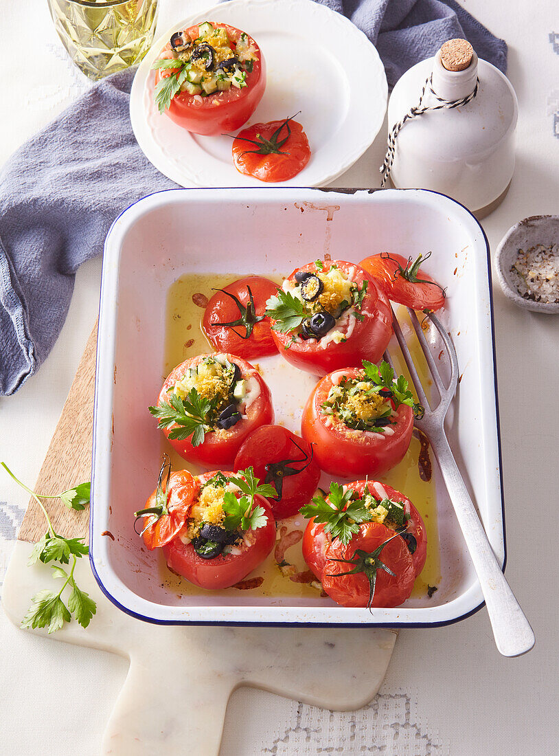 Stuffed tomatoes with mozzarella, courgette and olives