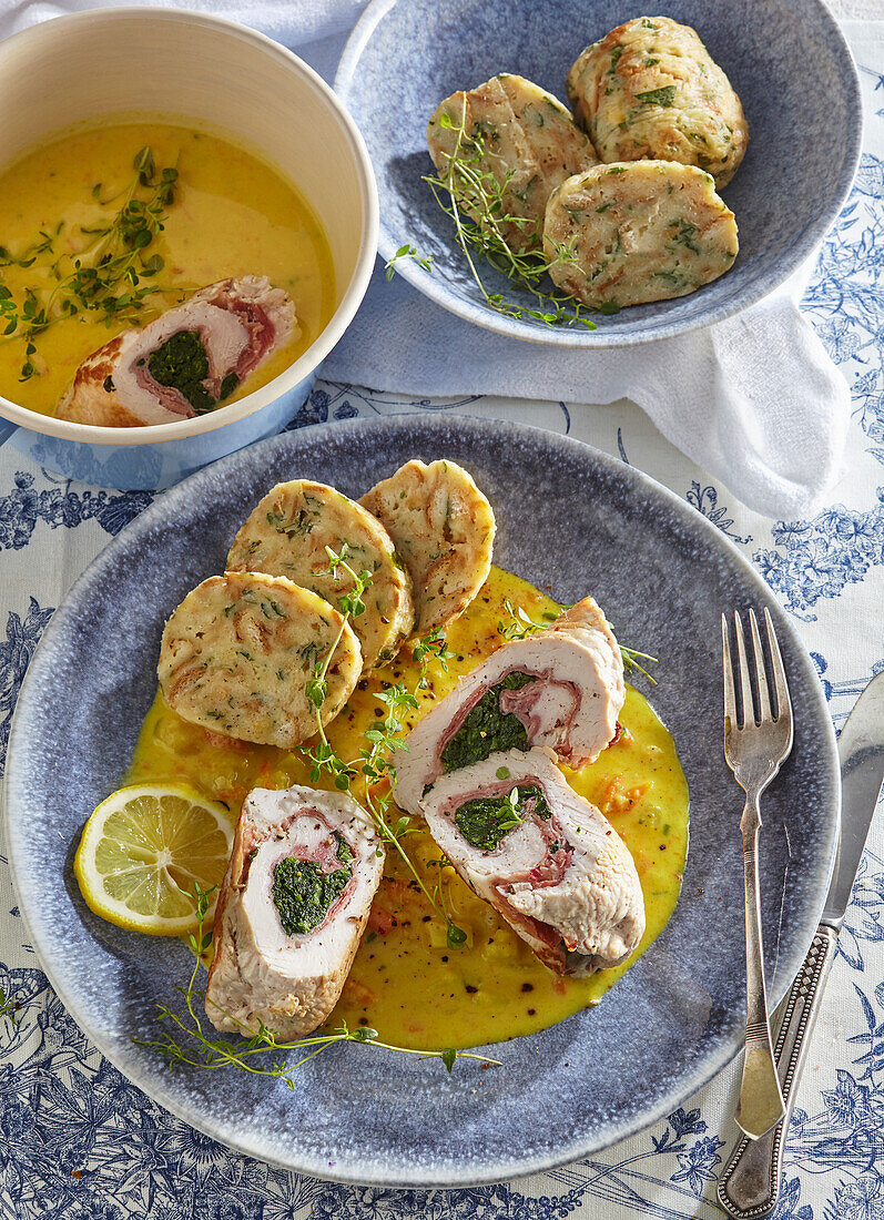 Turkey roulades with ham in a creamy vegetable sauce