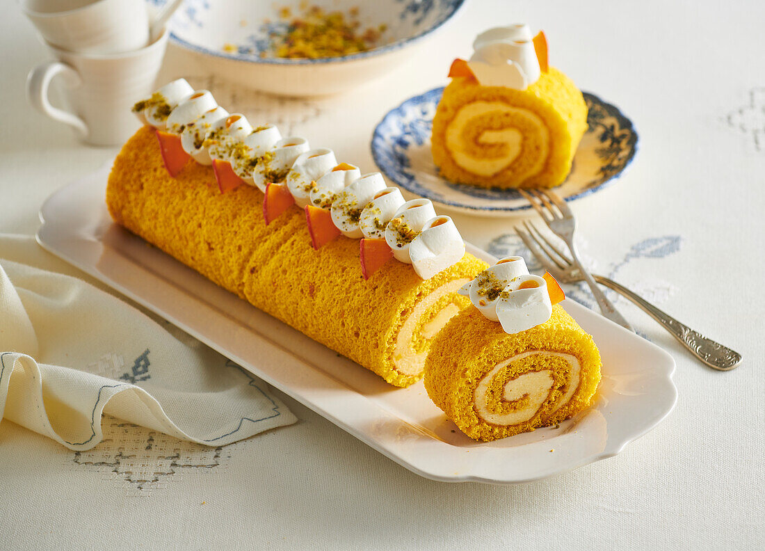 Pumpkin roulade with marzipan cream filling and cinnamon