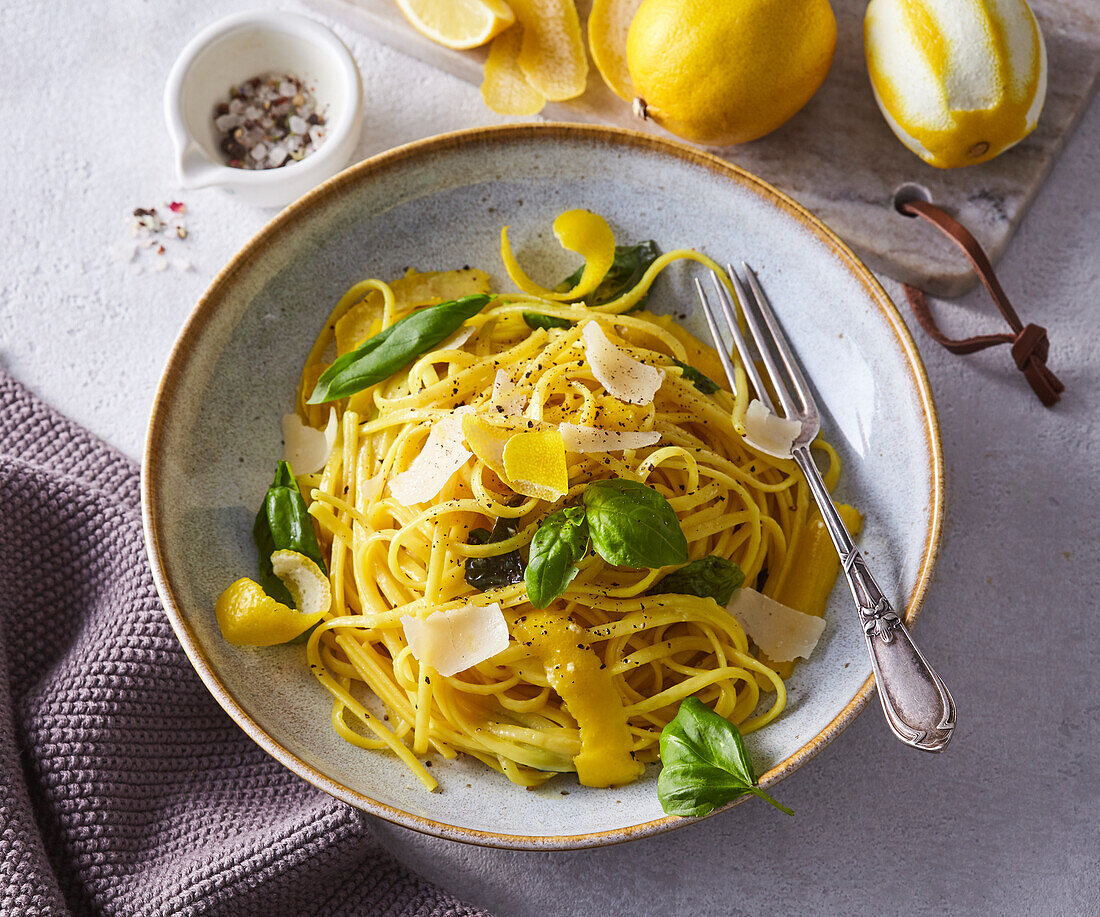 Linguine with lemon sauce, basil and parmesan shavings