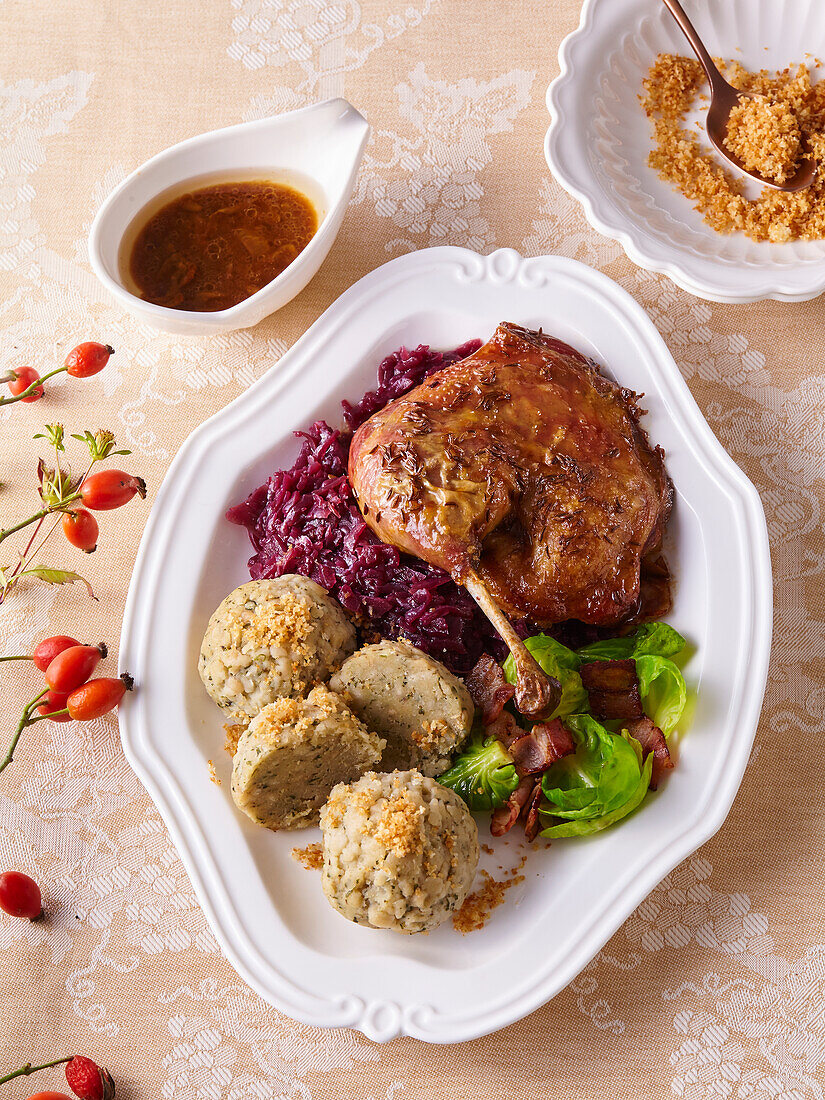 Roast leg of duck with red cabbage and dumplings