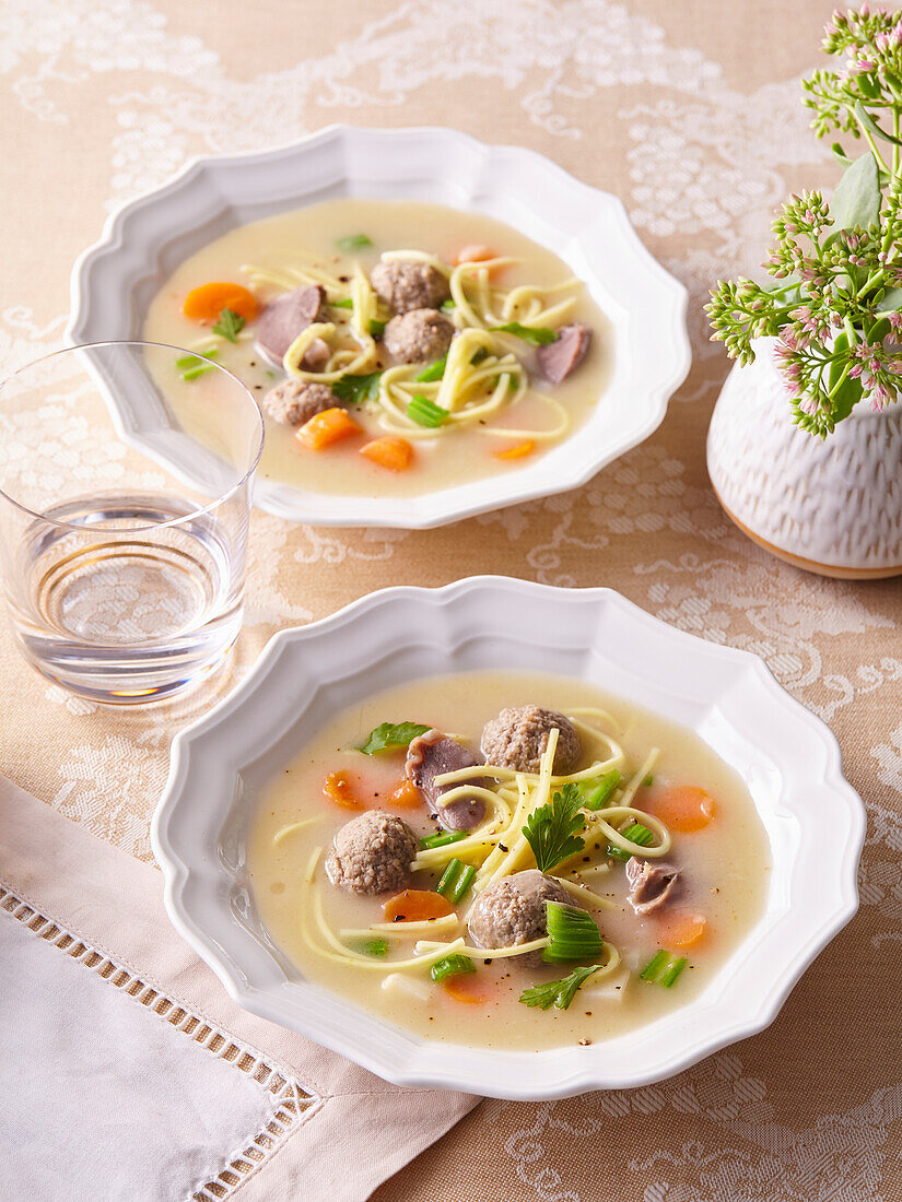 Duck soup with liver dumplings and vegetables