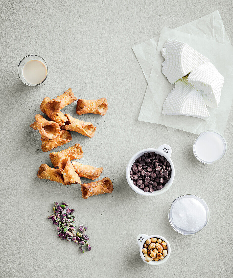 Ingredients for Baileys cannoli with pistachios and nuts