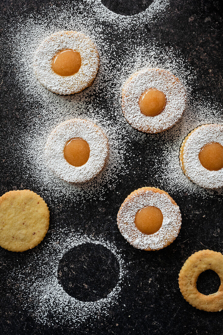 Sablé biscuits with jam filling and icing sugar
