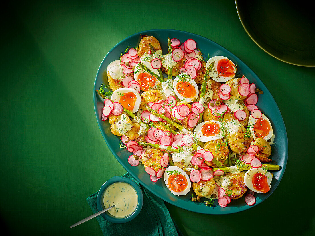 Potatoes with asparagus, eggs and pickled radishes