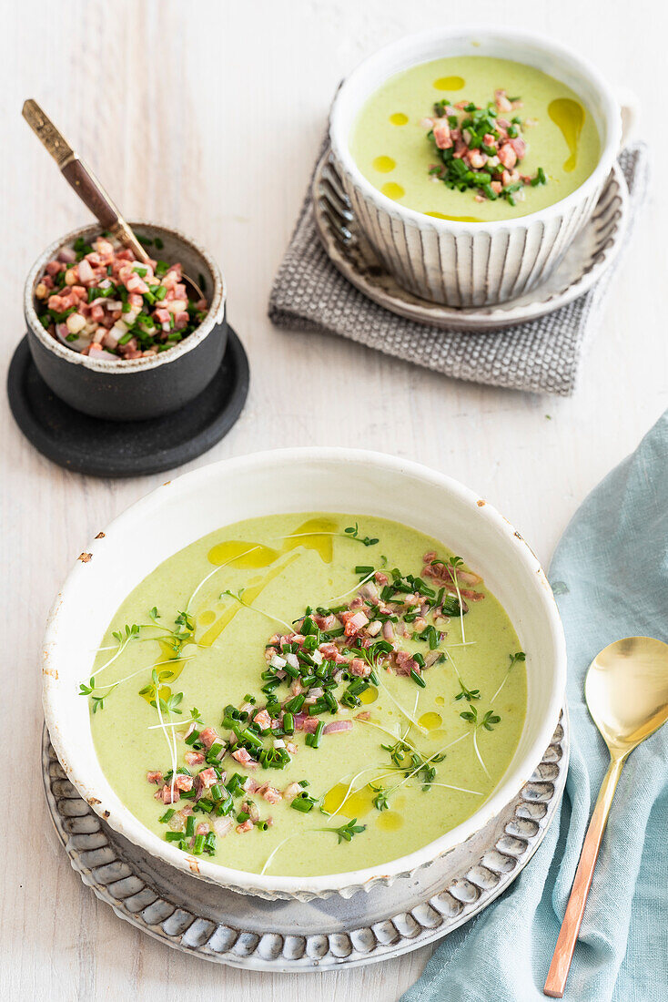 Pea soup with diced ham and fresh herbs