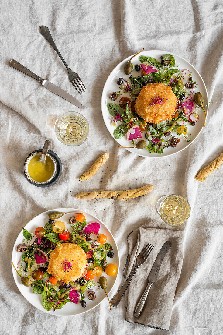 Baked burrata with salad and grissini