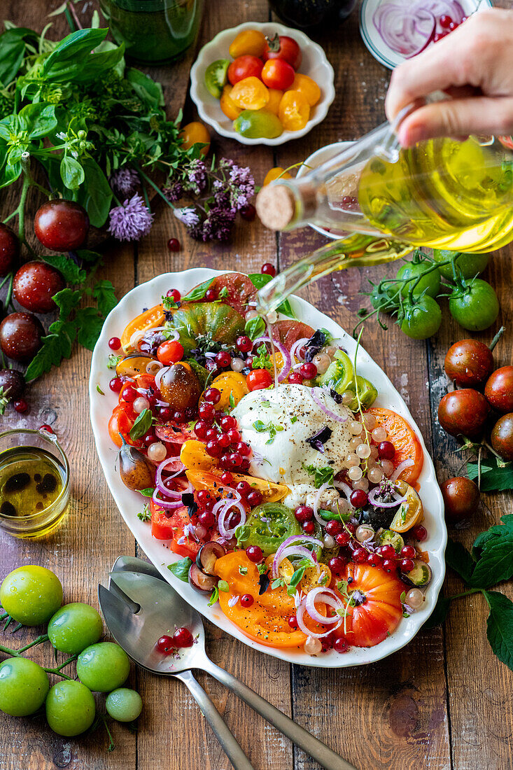 Tomato salad with burrata and redcurrants