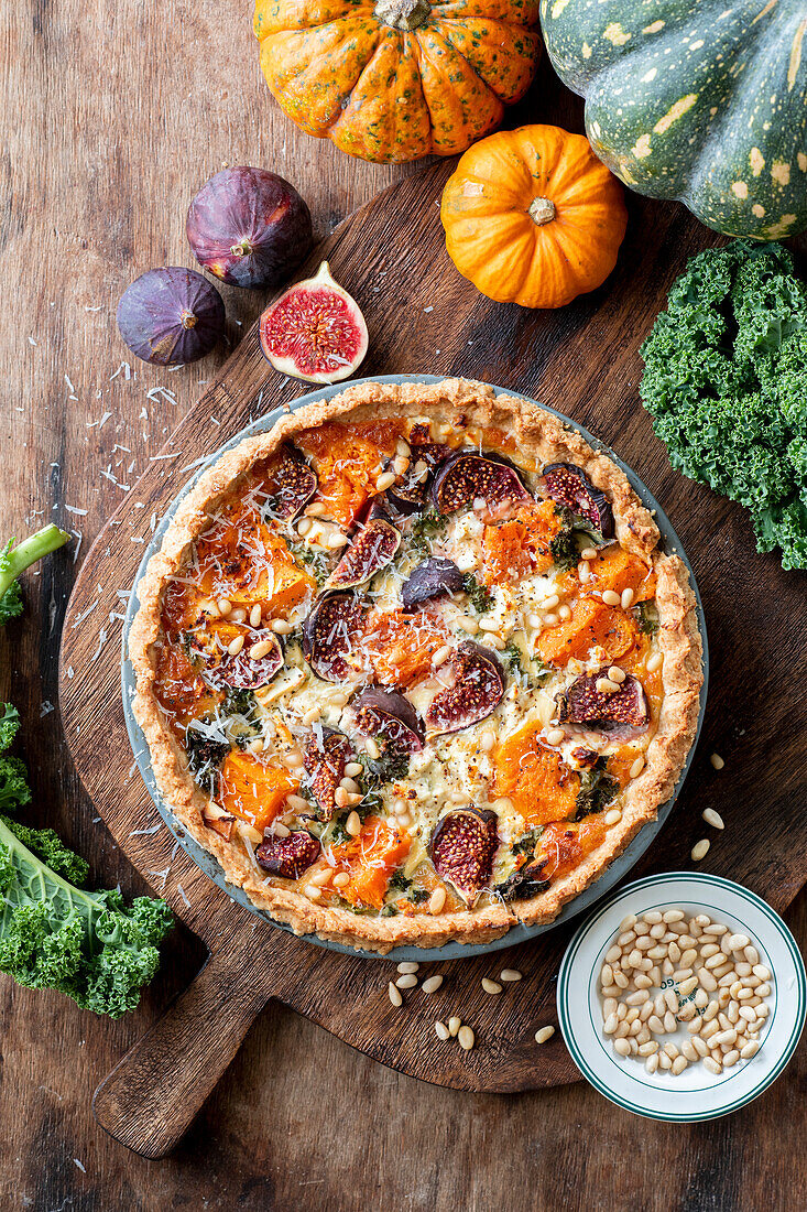 Pumpkin and fig tart with nuts and kale