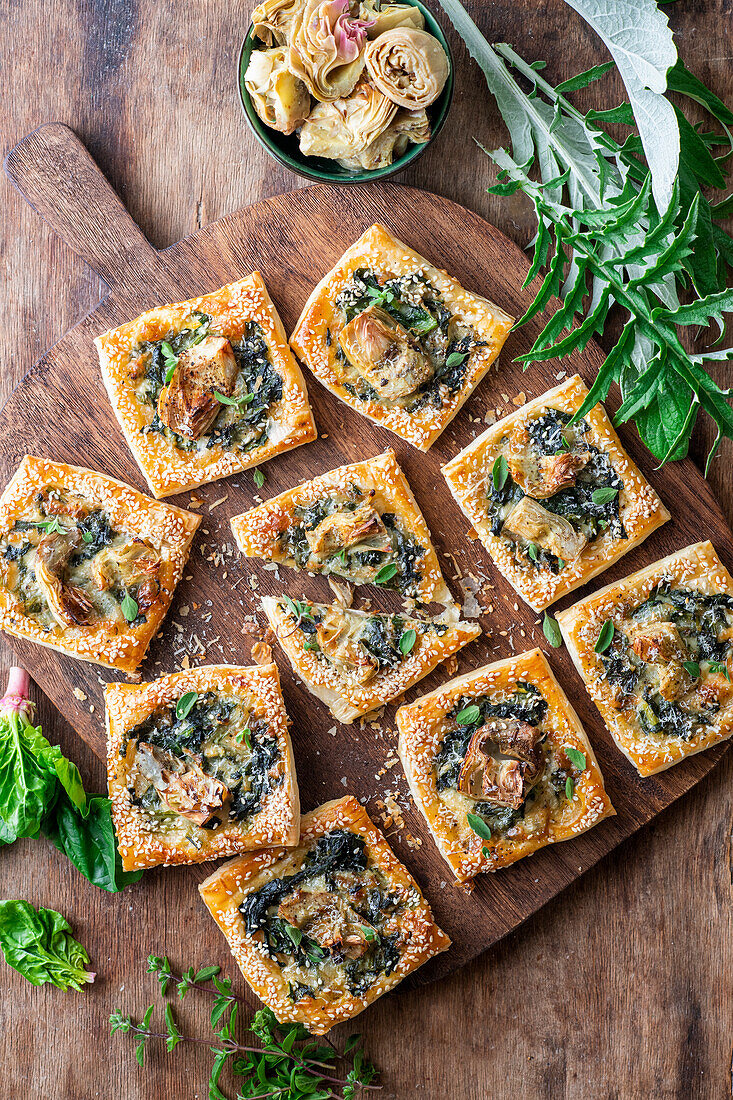 Artichoke puff pastry pockets with spinach and cheese