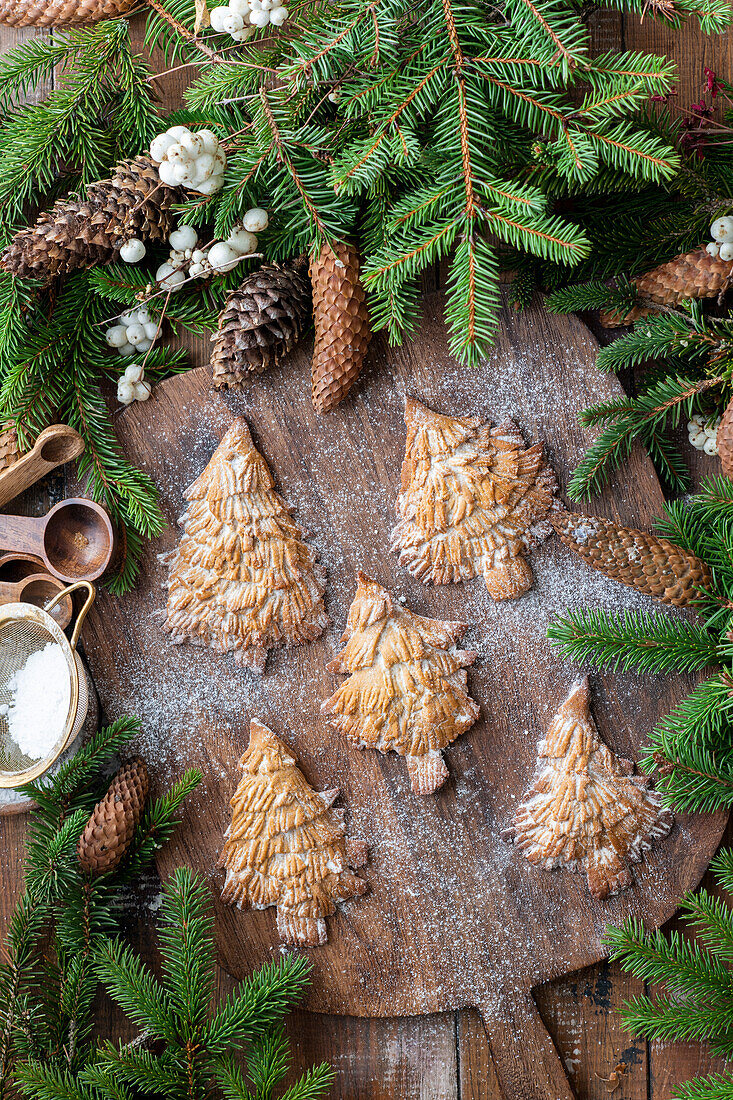 Christmas tree biscuits with icing sugar