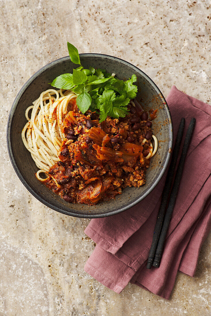 Udon noodles with black beans, minced chicken and kimchi
