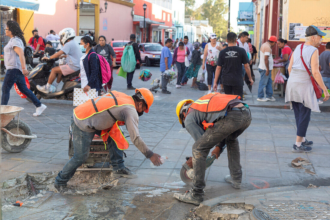 Workers rebuilding street