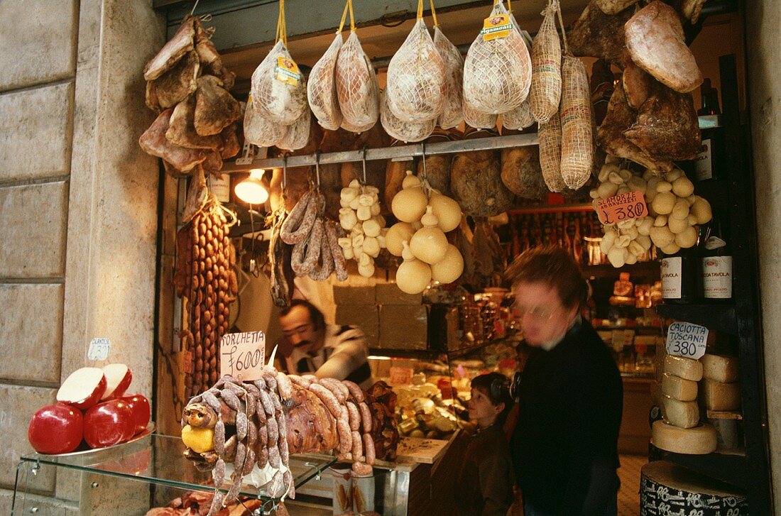 Italian grocer's shop with cheese, ham etc