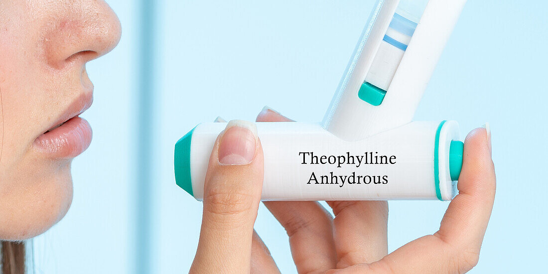 Theophylline anhydrous medical inhaler, conceptual image