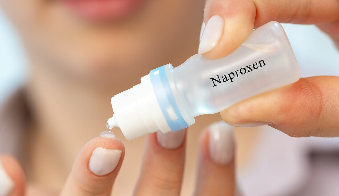 Naproxen medical drops, conceptual image