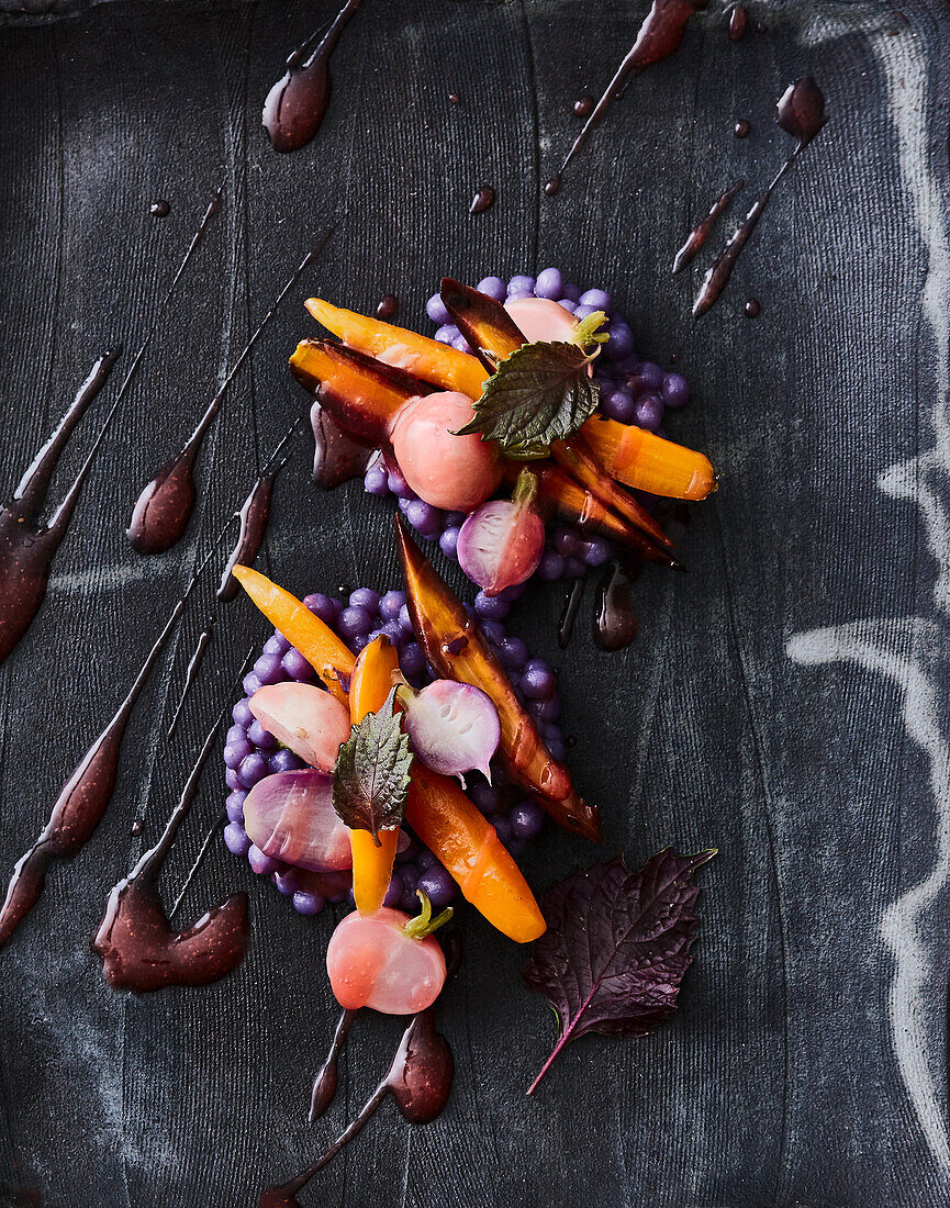 Sous-vide-cooked radishes and carrots on a plum and Madeira sauce