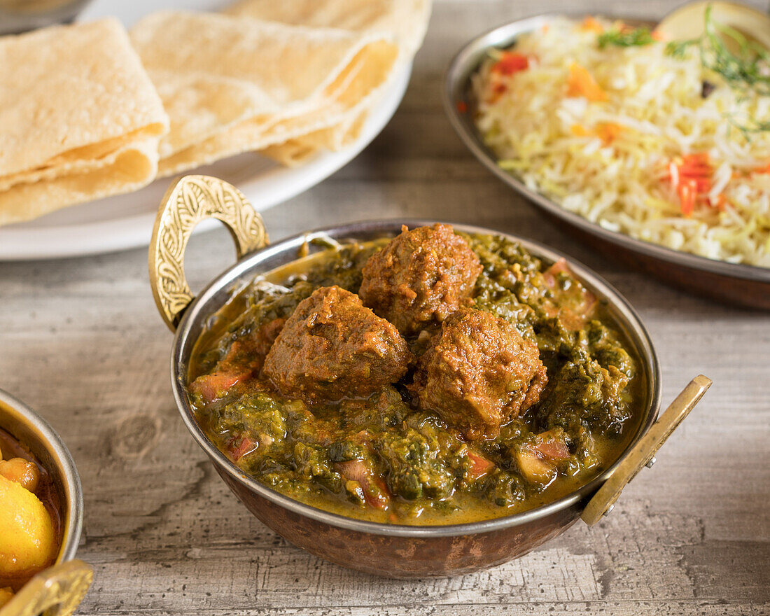 Lamb saag with basmati rice and papadam