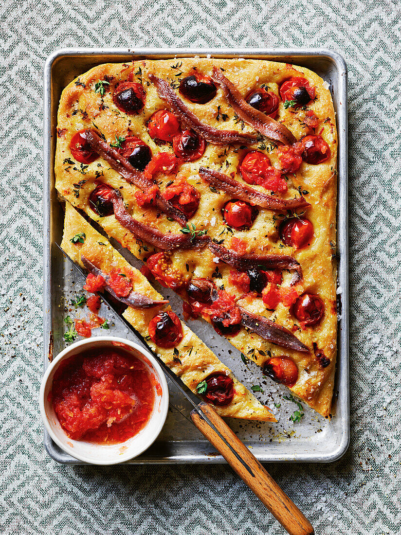 Focaccia with anchovies, tomatoes and thyme