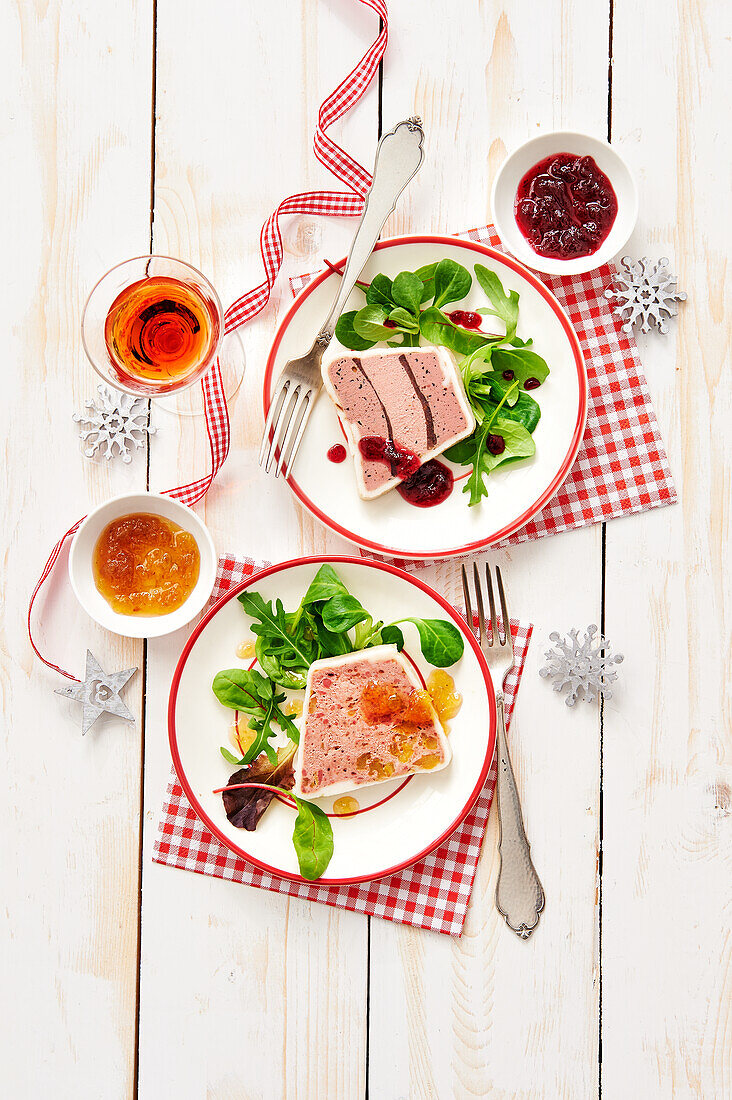 Two kinds of terrine with lamb's lettuce and cranberries