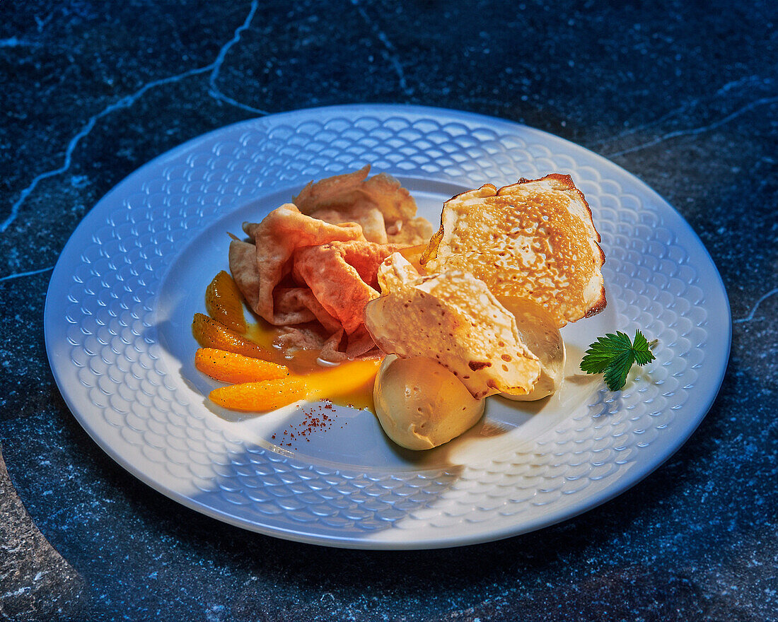 Crêpe Suzette with orange fillets and ice cream
