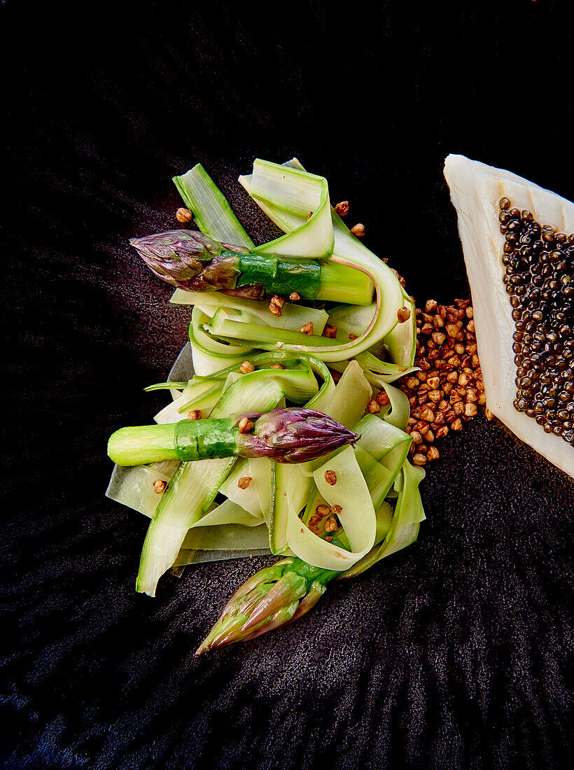 Asparagus and courgette strips with fried parsley fillet and caviar