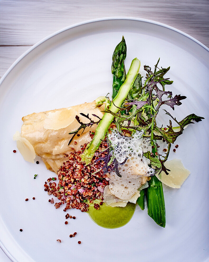Sea bass fillet with green asparagus, espuma and puree
