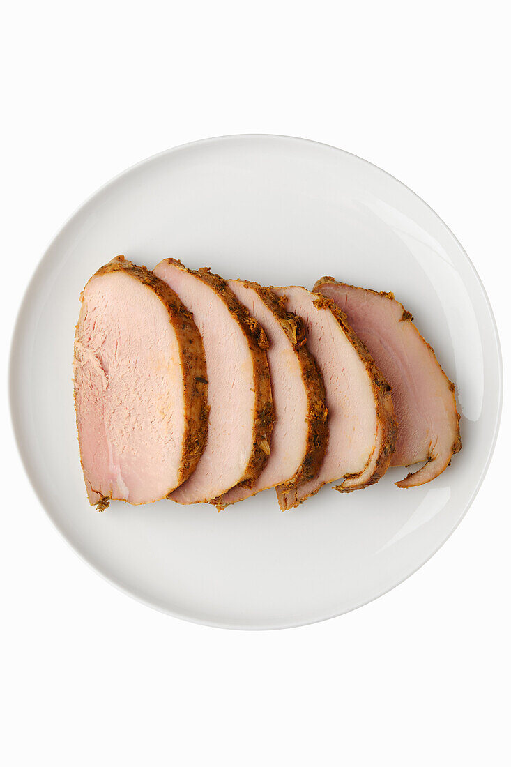 Sliced pork loin roast on a plate
