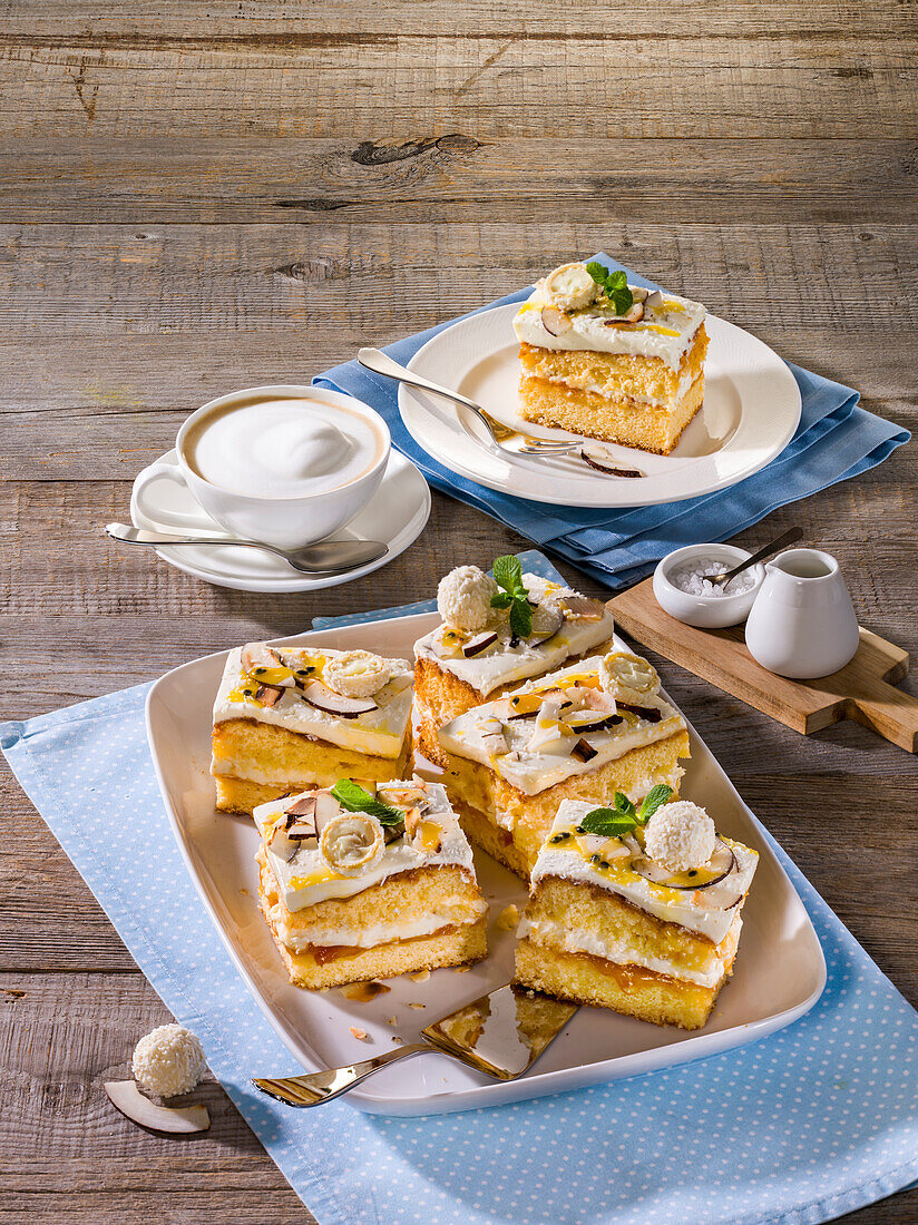 Exotic sheet cake with peach and passion fruit jam and coconut