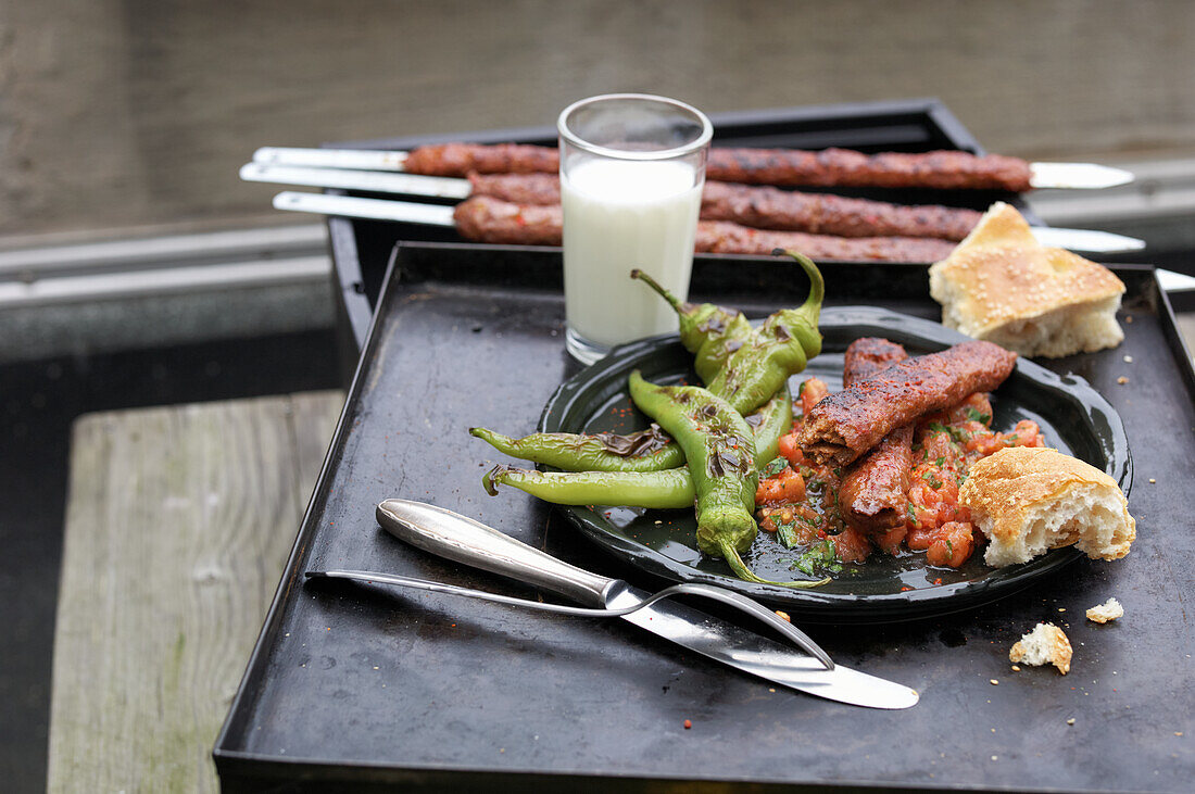 Turkish Adana kebap with grilled peppers