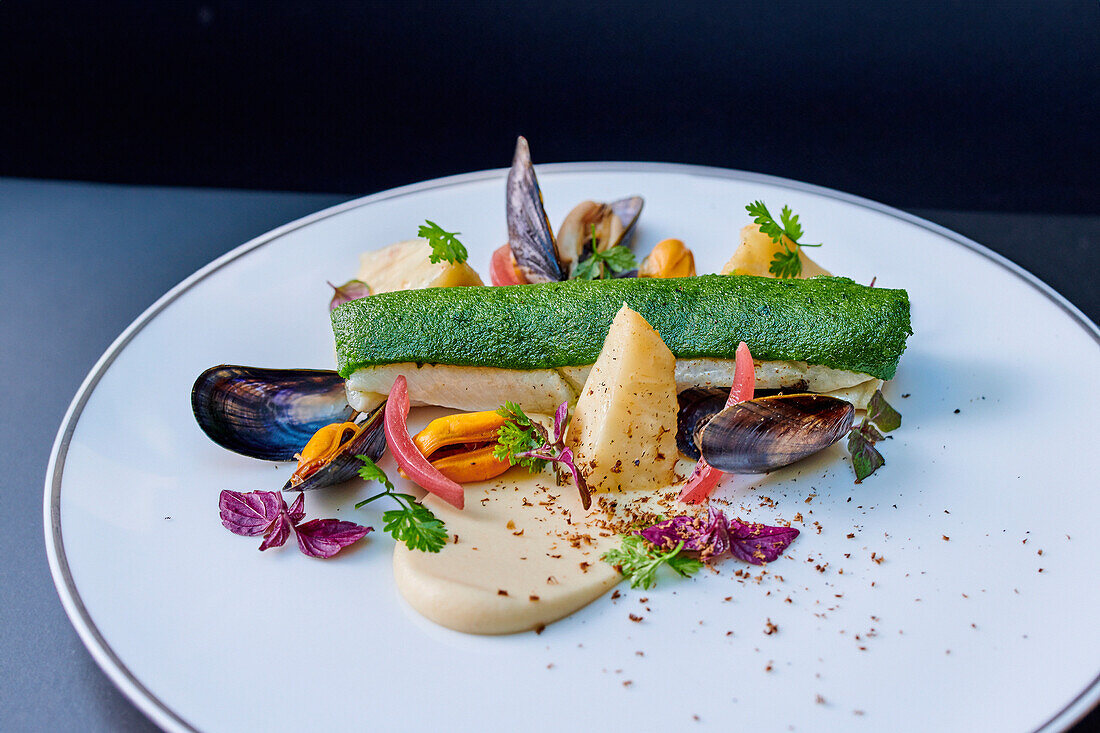 Fried sole in a herb crust with bouchot mussels and celeriac puree