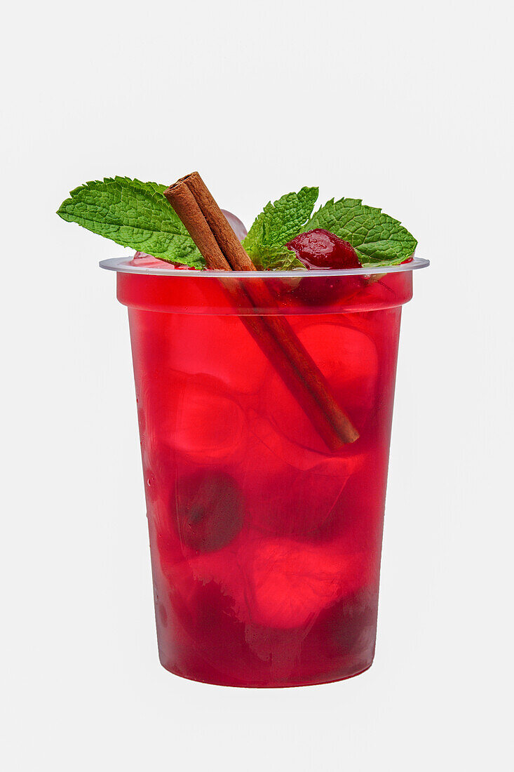 Cherry lemonade with mint and cinnamon stick