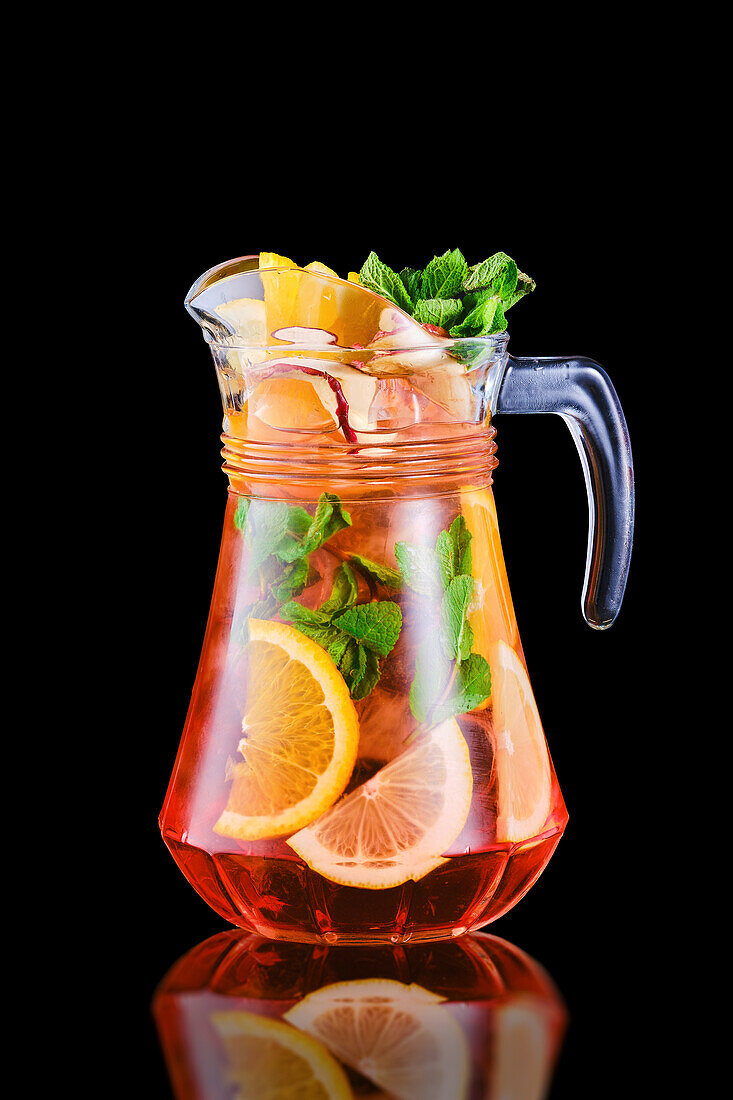 Sangria with citrus fruits and mint