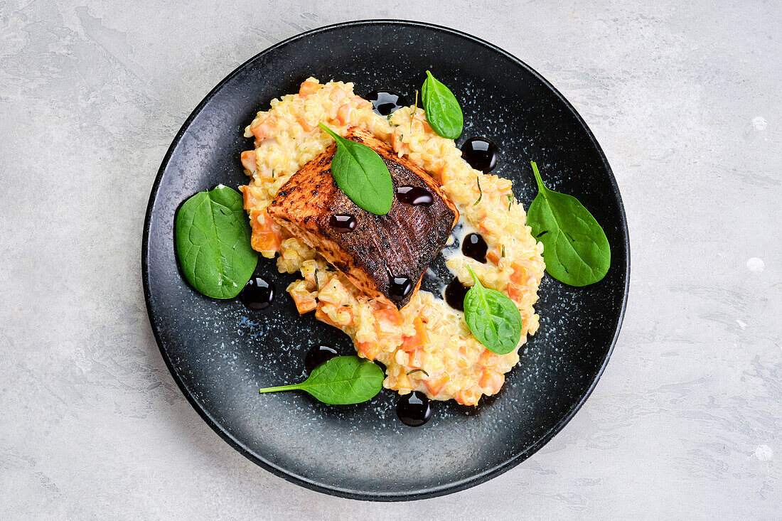 Roasted salmon steak with bulgur-sweet potato puree