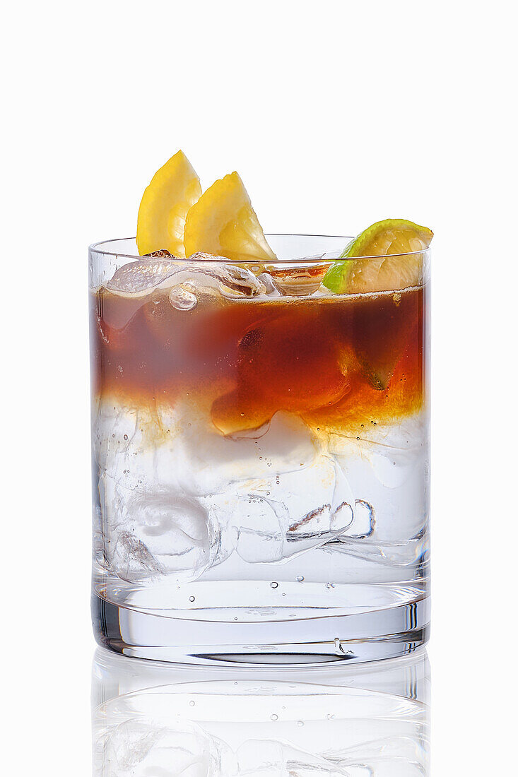 Espresso tonic with ice and citrus fruit